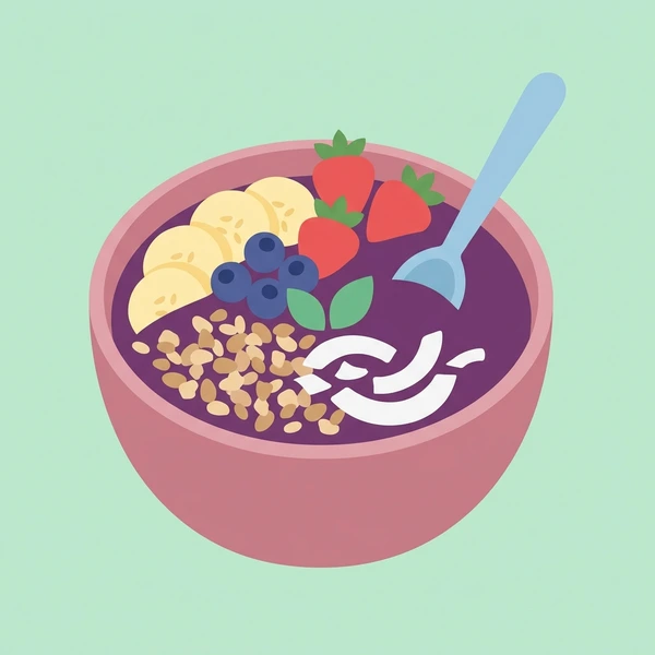 Acai smoothie bowl topped with banana slices, blueberries, strawberries, and crunchy granola