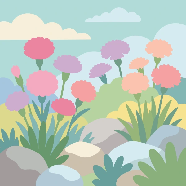 Pink lavender and peach fluffy dianthus flowers among rounded grey and white rocks with green grass and soft pastel hills behind
