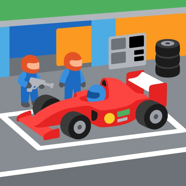 Red formula style race car with a helmeted driver in the pit lane, two blue-suited mechanics with tools, stacked tyres, and a blue and orange garage wall behind.