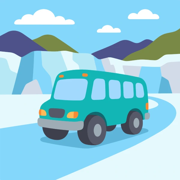 Teal, charcoal, and light blue glacier tour bus surrounded by white snow, blue shadows, pine trees, and cold mountains.