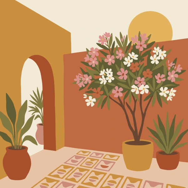 Pink and white flowering oleander tree in a golden yellow pot inside a warm terracotta and ochre Mediterranean courtyard with a rounded arched doorway and tropical plants