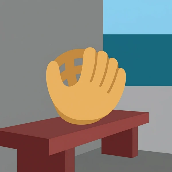 Tan leather softball glove resting on a dark red wooden dugout bench with a gray sky backdrop