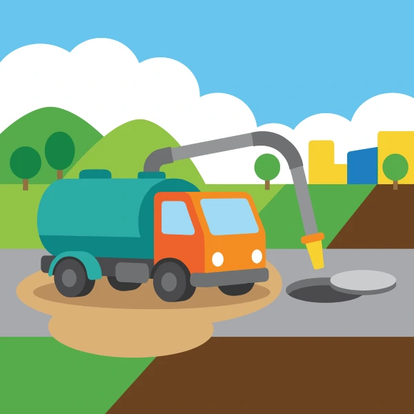 Teal vacuum truck with an orange cab and a grey suction hose pumping into an open manhole on a grey road, with green hills, trees, and yellow and blue buildings behind.