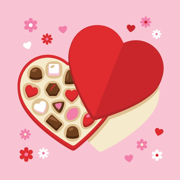 Open heart-shaped red box of assorted chocolates on pink background with small hearts and flowers scattered around